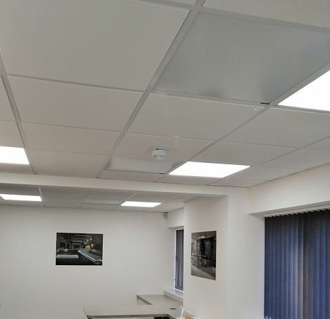 Ceiling grid heaters for offices